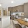 kitchen with island and pendant lighting and dining table
