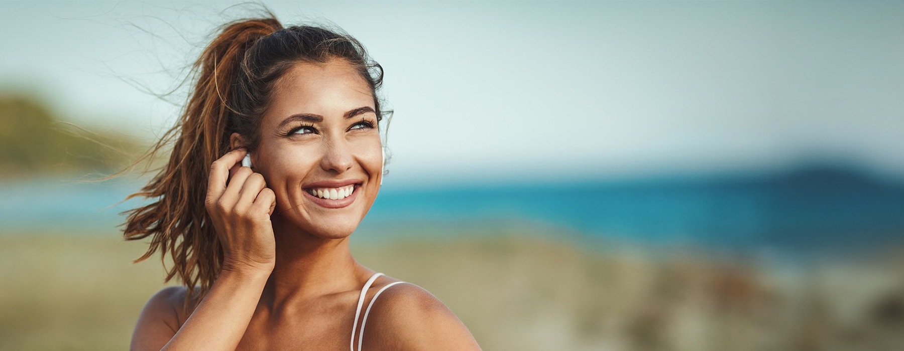 woman out for exercise at the beach